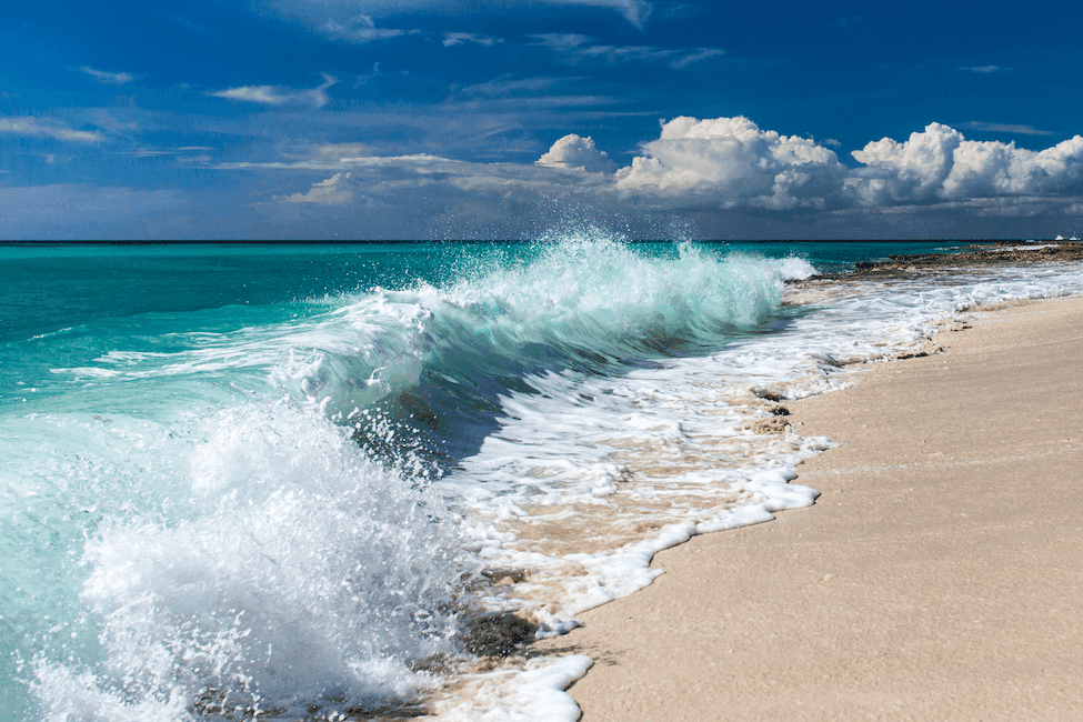 Wave crashing on beach